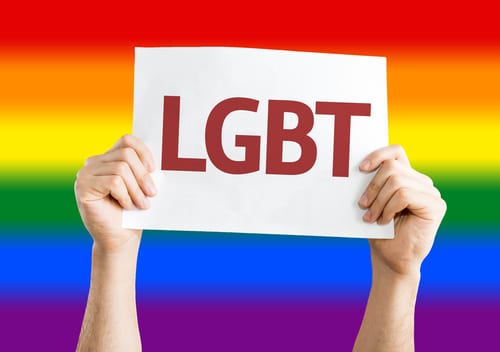 LGBT sign with rainbow background