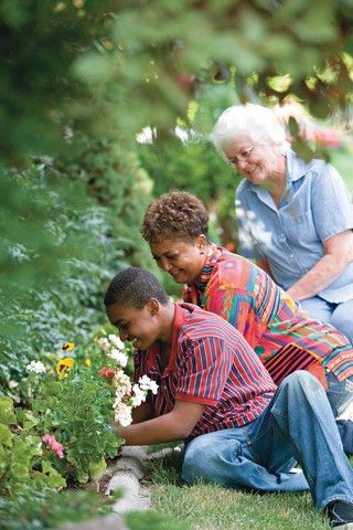 young_man_woman_elderly_gardening