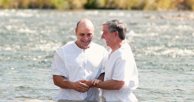 2023 33b baptism_men_in_lake