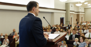 a man speaking in sacrament meeting