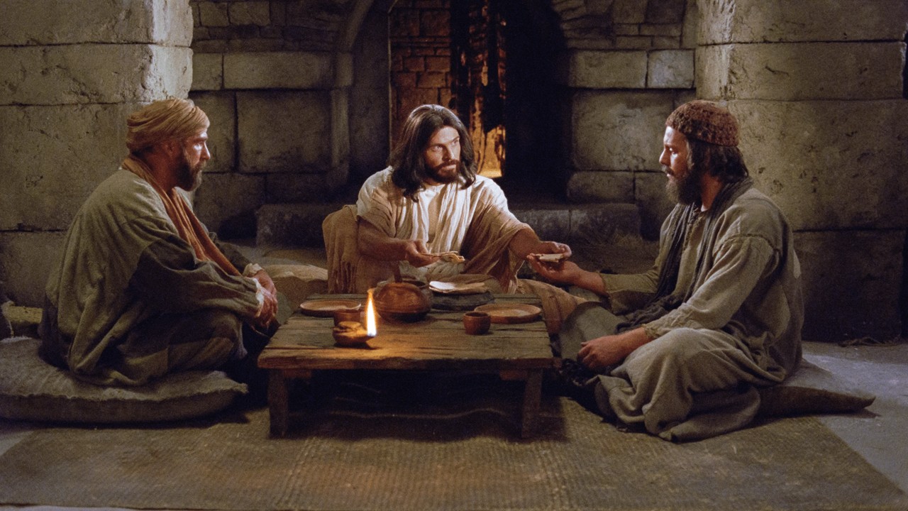 A group of men sitting around a table